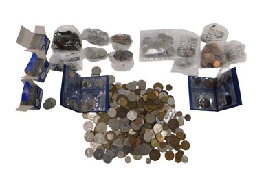 Lot 610 - A quantity of loose coinage, comprising a tin...