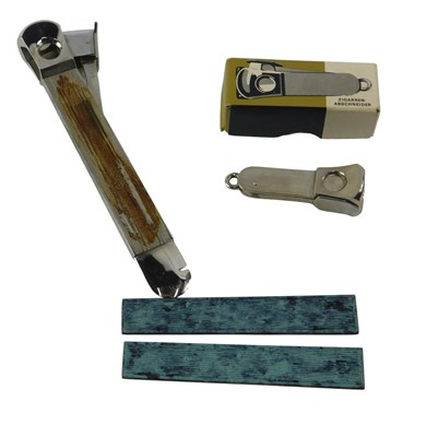 Lot 626 - Two cigar cutters, comprising a Western German...