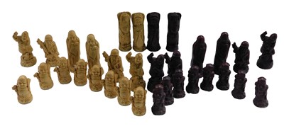 Lot 632 - A 20thC resin chess set, of Oriental figures...