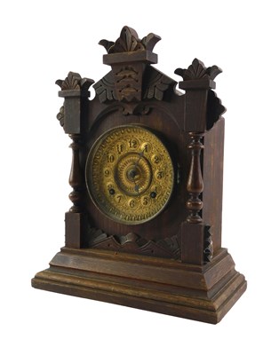 Lot 202 - A 20thC mahogany mantel clock, with an arched...