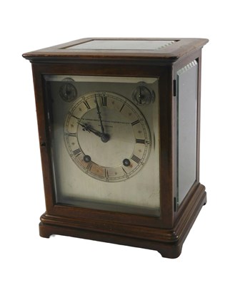 Lot 25 - A late 19thC mahogany mantel clock, with...