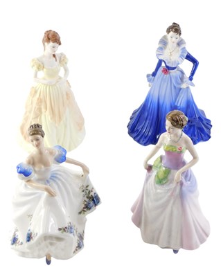 Lot 235 - Four ceramic ladies, comprising two Coalport...