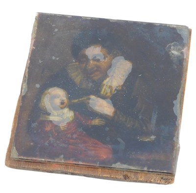 Lot 240 - A late 19thC print on glass, man feeding child,...