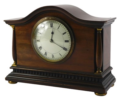 Lot 250 - An Edwardian mantel clock, the arched top...