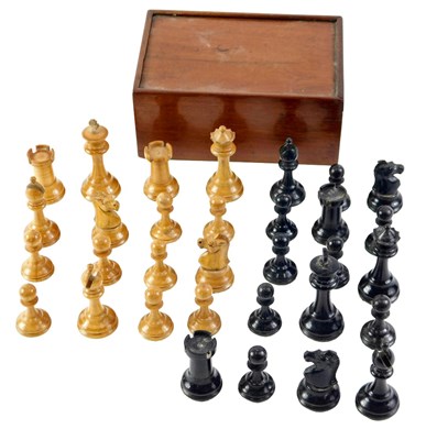 Lot 258 - A Staunton style wooden chess set, in wooden...