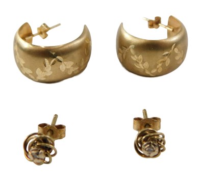 Lot 530 - A pair of 9ct gold hoop earrings, with...