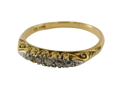 Lot 82 - A diamond set gypsy ring, set with five old...