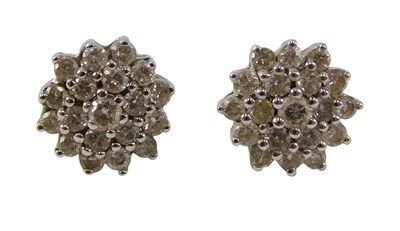 Lot 519 - A pair of 9ct gold diamond floral cluster...