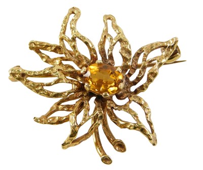 Lot 94 - A 9ct gold bark effect brooch, the centre set...
