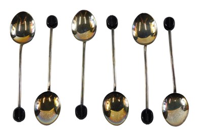 Lot 575A - A cased set of six silver and enamel coffee...