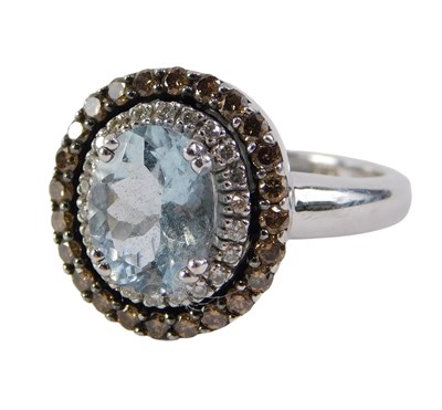 Lot 36 - A 14ct white gold aquamarine and diamond oval...