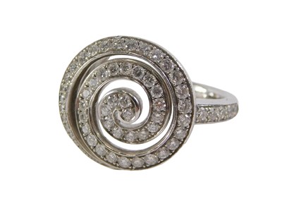 Lot 37 - A platinum diamond swirling dress ring, the...