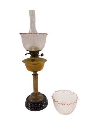 Lot 704 - A Victorian brass and copper oil lamp, the...