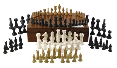 Lot 274 - A wooden box containing various chess sets. (AF)