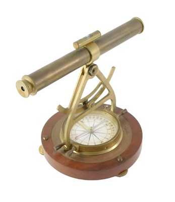 Lot 277 - A modern brass Sextant, the teak base inset...