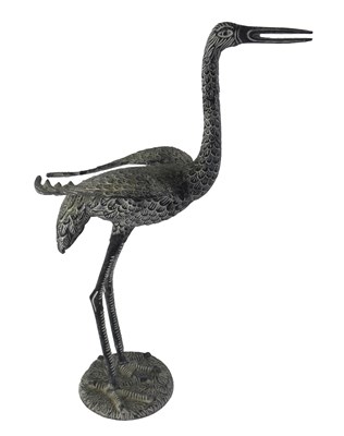 Lot 724 - A modern cast metal figure of an Oriental...
