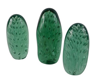 Lot 727 - A pair of Nailsea type green glass dumps, each...