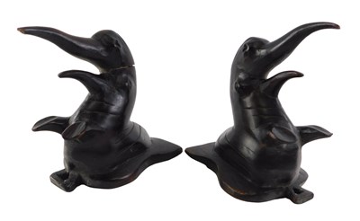 Lot 739 - A pair of African hardwood wall masks, each...