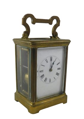 Lot 740 - A French brass carriage clock, the white...