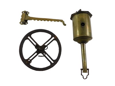 Lot 748 - A brass spitjack, with iron rack, and wall...