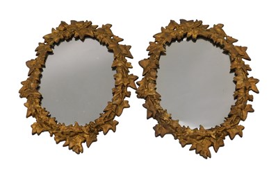 Lot 775 - A pair of 19thC gilt cast metal oval wall...