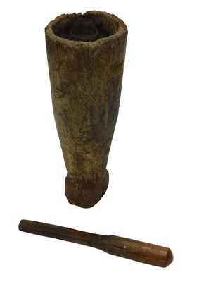 Lot 786 - A rustic wooden mortar, of tapering form, 82cm...
