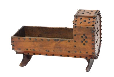 Lot 794 - A 19thC pine doll's crib, with studded...