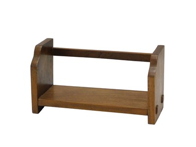 Lot 798 - An oak book rack, of plain form, with shaped...