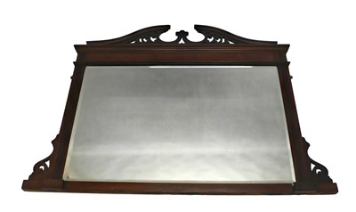 Lot 780 - An Edwardian walnut overmantel mirror, pierced...