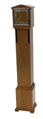 Lot 782 - An Art Deco grandmother clock, in walnut case...