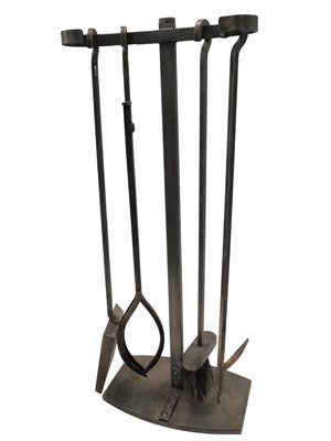 Lot 809 - A blacksmith made wrought metal fireside...