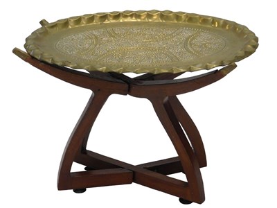 Lot 811 - An Indian embossed oval brass tray, 59cm...
