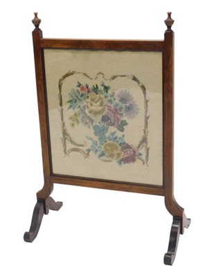 Lot 813 - An Edwardian walnut fire screen, with floral...