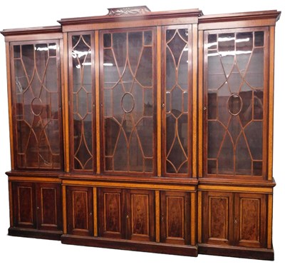 Lot 26 - A late 19thC mahogany and satinwood breakfront...