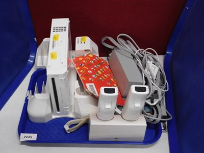 Lot 2245 - A Nintendo Wii, together with controllers,...