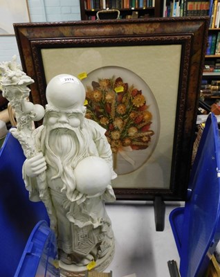 Lot 2274 - A resin figure of an Oriental gentleman...