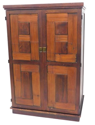 Lot 881 - A modern hardwood and bamboo inlaid...
