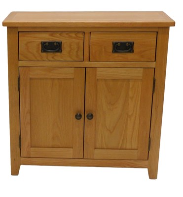 Lot 886 - A light oak small side cabinet, with two...