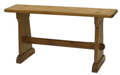 Lot 910 - An oak Arts & Crafts style bench, with shaped...