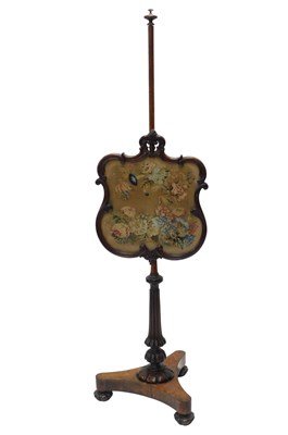 Lot 897 - A William IV rosewood pole screen, the...