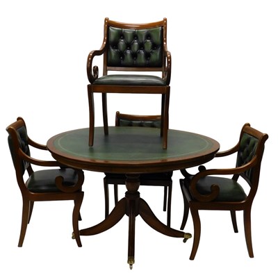 Lot 902 - An oak library table, the circular top with a...