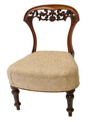 Lot 915 - A Victorian rosewood nursing chair, the shaped...