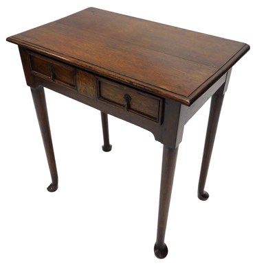 Lot 922 - An 18thC oak lowboy, the rectangular top with...