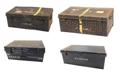 Lot 955 - A collection of four military tin trunks, to...