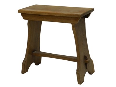 Lot 958 - A light oak stool, the rectangular top on...