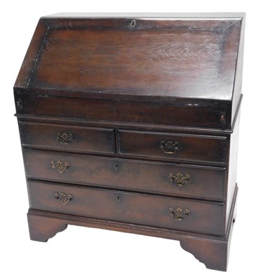 Lot 960 - A dark oak bureau in mid 18thC style, the fall...