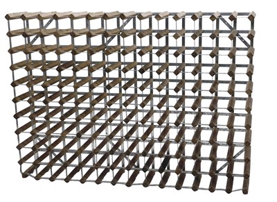 Lot 979 - A pine and galvanised metal wine rack, label...