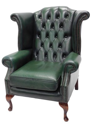 Lot 1006 - A Laura Ashley green buttoned leather wingback...