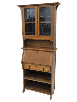 Lot 1009 - An early 20thC oak student's bureau...