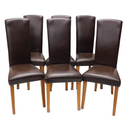 Lot 1010 - A set of six brown leather and beech highback...